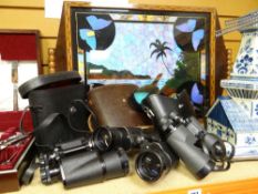 THREE CASED SETS OF BINOCULARS together with a decorative butterfly leaf twin-handled tray