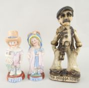 GLAZED STONEWARE MODEL OF A STANDING GENTLEMAN inscribed 'The Rhondda Miner', 27cms high together