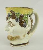 EARLY 19TH CENTURY PEARLWARE SATYR JUG with loop handle, possibly Pratt 9.75cms high