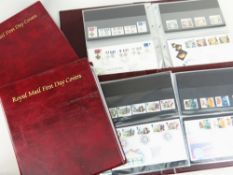FOUR RED ROYAL MAIL FIRST DAY COVER ALBUMS containing various subjects including sport, wildlife,