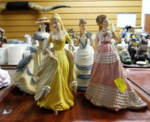 FOUR WEDGWOOD FIGURINES in matte decoration