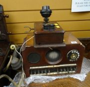 MID-CENTURY TELEPHONE SWITCH BOARD WITH DIAL together with a wall mounted two-piece wooden and brass