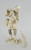 MEIJI PERIOD IVORY OKIMONO SECTIONAL FIGURE OF A FISHERMAN WITH NET, on naturalistic base, red