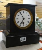 BLACK SLATE MANTEL CLOCK with Roman numerals on a circular face