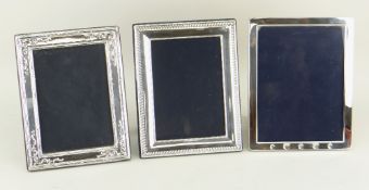 THREE SIMILAR SILVER PORTRAIT PHOTOGRAPH FRAMES of rectangular and similar size (3)