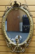GILT MIRROR WITH THREE-CANDLE HOLDER