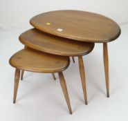 NEST OF ERCOL PEBBLE OCCASIONAL TABLES, largest 65cms wide