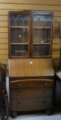 TWO VINTAGE WOODEN OFFICE-STYLE DESKS together with a vintage bureau bookcase (3)