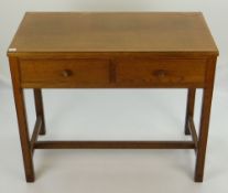 GORDON RUSSELL OAK RECTANGULAR TABLE fitted with two moulded edged frieze drawers, turned oak knobs,