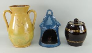 THREE EWENNY CLAYPITS ITEMS comprising a biscuit barrel, a baluster vase inscribed 'Call A Dwylla