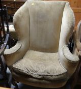 GOOD VINTAGE WINGBACK FIRESIDE CHAIR of shapely form with sweeping arms, on carved ball and claw