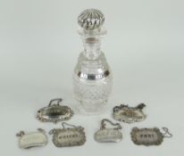 HOBNAIL CUT SMALL DECANTER WITH SILVER COLLAR, engraved 'Maderia' with silver spiral design stopper,