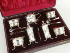 EDWARD VII SILVER SEVEN PIECE CRUET SET, Birmingham 1901, the fitted box with mustard, four salts