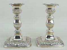 PAIR OF LATE VICTORIAN SILVER (LOADED) SHELL DESIGN CANDLESTICKS with London 1899 makers mark WCJL