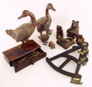 THREE GRADUATED BRONZE FIGURES OF DUCKS together with a collection of carved wooden Black Forest be
