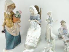 TWO LARGE LLADRO FIGURINES, one of a lady embroidering, together with a small group of Lladro