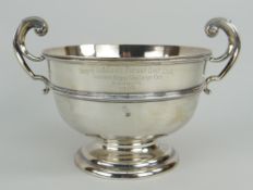 EDWARD VII SILVER PEDESTAL TROPHY CUP having twin whip lash handles, engraved 'Royal Ashdown