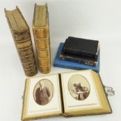 TWO VICTORIAN PHOTOGRAPH ALBUMS, tooled leather embossed covers and gilt metal clasps, containing
