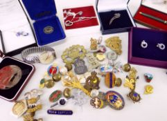 ASSORTED METAL & ENAMEL BADGES including military and railway items, and a wristwatch by Accurist