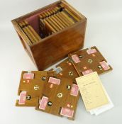WHIST BOX containing 17 ply-wood slides with painted letters and numbers, and playing cards