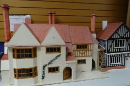 LARGE EDWARDIAN TYPE DOLLS HOUSE and a similar Tudor type dolls house with contents (2)