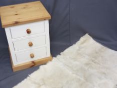 MODERN PINE & PAINTED THREE DRAWER CHEST, 63cms H, 48.5cms W, 42.5cms D and a sheepskin rug