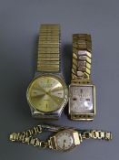 MUST 'DE' CARTIER SILVER BACKED WRISTWATCH and two gold examples, the Cartier Quartz with