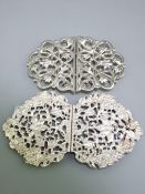 SILVER NURSES' BELT BUCKLES X 2, having ornate flower design, London 1988 and Woven Hearts design,