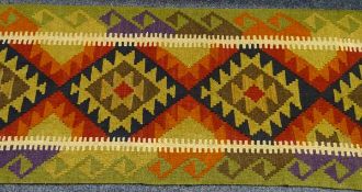 MAIMANA KILIM RUNNER - green ground autumnal colours with a diamond pattern block centre, 200 x