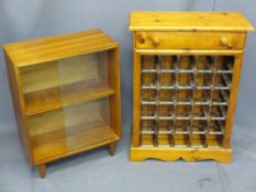 NEAT TEAK BOOKCASE with a reproduction pine wine rack, 70.5 and 81.5cm heights