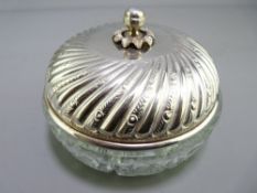 CONTINENTAL SILVER LIDDED POWDER BOWL, stamped '900' with makers mark to lid on a heavy cut glass