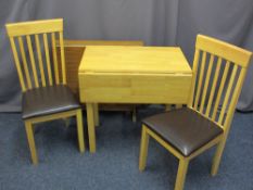 MODERN LIGHTWOOD DINING TABLE & TWO CHAIRS and a slim fold-away table, various measurements