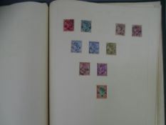 UNTITLED GREEN HARDBACK ALBUM containing Early India, Canadian and other samples