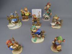 HUMMEL FIGURINE COLLECTION (7) along with a similar figurine of a young boy with lamb by Friedel