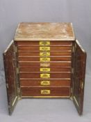 VICTORIAN MAHOGANY TWO DOOR CUTLERY CABINET on nine interior drawers with inset brass handles, 63.