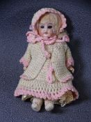 ANTIQUE PORCELAIN HEADED DOLL (damaged) approximately 20cms long