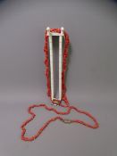 DOUBLE CORAL BEAD NECKLACE and a single coral bead necklace, each with a yellow metal clasp