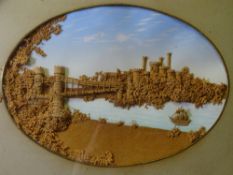 CIRCA 1900 FRAMED OVAL CORK WORK - depiction of Conwy Castle, 20 x 29cms