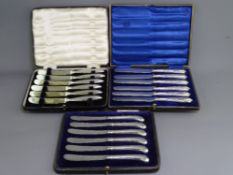 SILVER HANDLED BUTTER/TEA KNIVES, THREE BOXED SETS, 1910, 1913 and 1919 including a set with