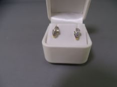 18CT GOLD DIAMOND SET EARRINGS, a pair, half hoop design with three rows of tiny diamonds, 2.6grms