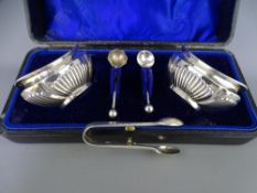 PAIR OF CASED BOAT SHAPED SILVER SALTS, 1.3ozs Birmingham 1900 with two non-matching spoons and a