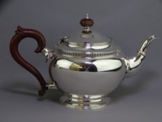 VINTAGE SILVER HEAVY TEAPOT - circular form on pedestal foot and with ornate girdle, London 1940,