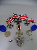 SECOND WORLD WAR GERMAN THIRD REICH & SS MEDALS & BADGES GROUP including a War Merit Cross and RZN