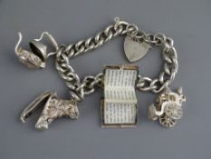 SILVER CHARM BRACELET with four large charms and padlock clasp, 55grms gross
