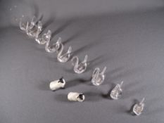 GLASS SWANS and two Beswick pottery black headed sheep, a small parcel