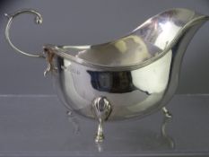 ASPREY LONDON SILVER SAUCE BOAT with scroll handle on three hoof feet, London 1921, 5.4 troy ozs,