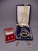 TWO PEARL NECKLACES and two pairs of pearl earrings