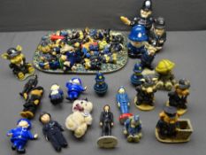 PIGGIN', and other novelty figurines of police officers and similar