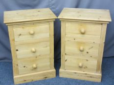 REPRODUCTION PINE THREE DRAWER CHESTS, a pair, 83.5cms H, 56cms W, 38cms D