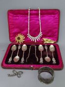 CASED SET APOSTLES TYPE SPOONS & TONGS, silver napkin ring and small selection of costume jewellery,